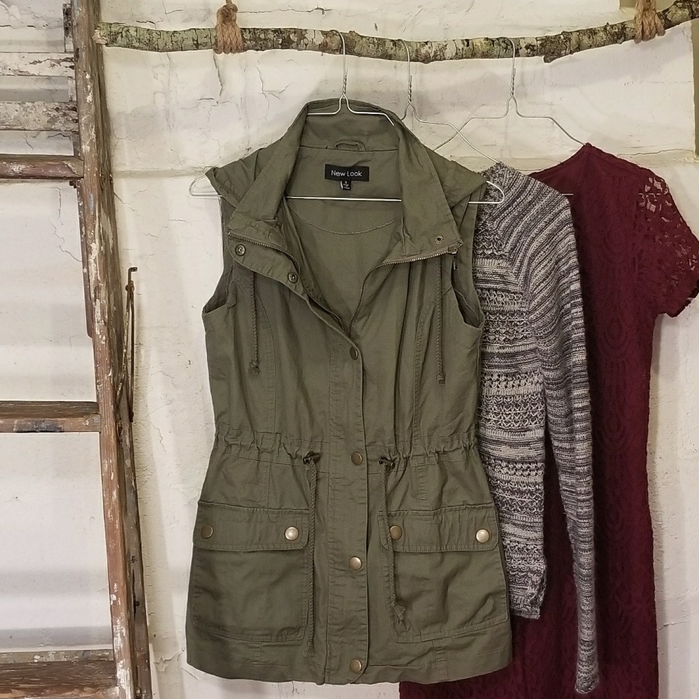 A hooded olive green vest